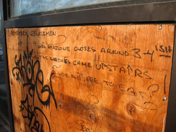 Graffiti on another board eulogises what someone once liked best about Picasso.